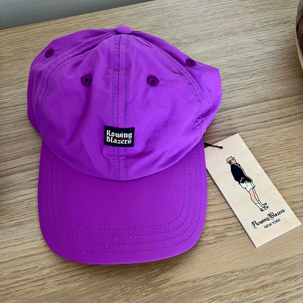 Rowing Blazers baseball hat. OS fits all, snap closure back. Purple